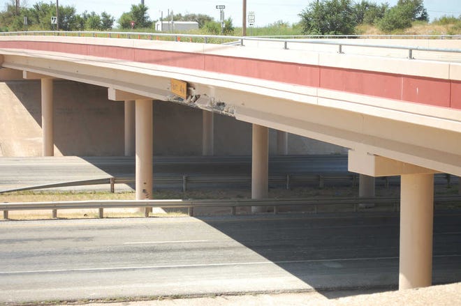 The North Loop 289 Ash Avenue overpass bridge is closed indefinitely. It was damaged when a tractor-trailer hauling a pump jack collided with the structure Monday.
