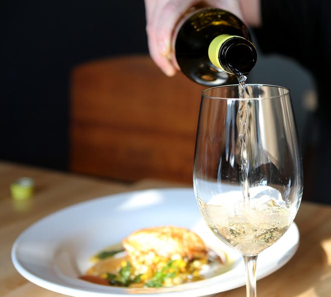 AlbariÃ±o white wine from Abacela in Southern Oregon is an ideal summertime pairing choice that “complements anything spicy,” says wine supplier Karly Kercheval of Galaxy Wine Company. (Collin Andrew/The Register-Guard)