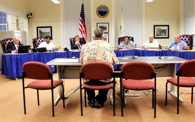 The Wareham Board of Selectmen questions Paul Ciccotelli, foreground, whom it later appointed to fill an open seat on the Historic District Commission.

Wicked Local Photo/Chris Shott