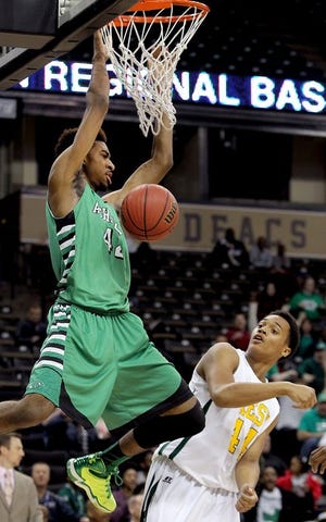 Ashbrook's Isaiah Whaley, shown here dunking in the 2015 Western N.C. 3A title game in Winston-Salem, will clash against one of the state's top teams in High Point Wesleyan on Dec. 5.