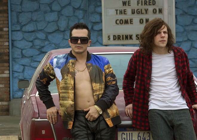 In this image released by Lionsgate, John Leguizamo, left, and Jesse Eisenberg appear in a scene from "American Ultra." (Alan Markfield/Lionsgate via AP)
