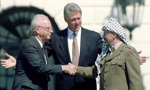 The famous handshake between the then Palestinian president, Yasser Arafat, and Yitzhak Rabin, the then Israeli prime minister, at the Clinton White House.