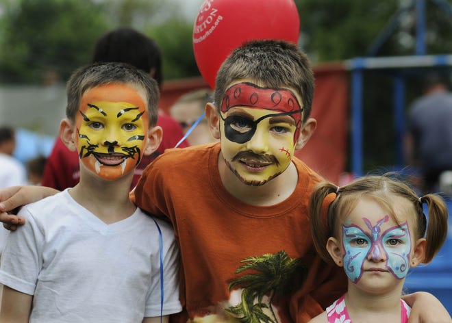 Children show off their painted faces at a previous Old Home Day in Charlton. T&G File Photo/Christine Peterson
