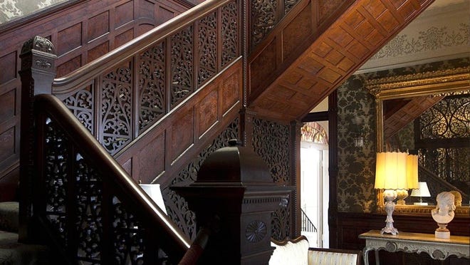 Chateau Bellevue, Victorian mansion in downtown Austin that belongs to the Austin Woman's Club, boasts intricate details such as the banister's woodwork, but club representatives say the facility needs substantial rehabilitation.
