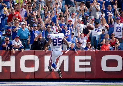Buffalo Bills tight end Charles Clay (85) scores a touchdown against the Pittsburgh Steelers during the first half of a preseason NFL football game on Saturday, Aug. 29, 2015, in Orchard Park, N.Y. (AP Photo/Gary Wiepert)