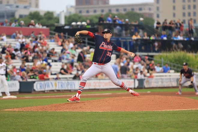 Chiefs All-Star lefty Austin Gomber powers toward the plate during Peoria's 4-2 win over Quad Cities at Modern Woodmen Park on Aug. 29, 2015.
