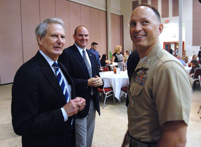 U.S. Congressman Walter B. Jones, left, speaks with, Col. Chris Pappas III, Commander of MCAS Cherry Point, right, and Will Lewis, Mayor of Havelock, second from left, at the Havelock Chamber of Commerce 4th annual Federal Update Luncheon at the Havelock Tourist and Event Center Thursday in Havelock.