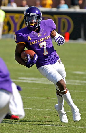 In this Oct. 4, 2014, file photo, East Carolina wide receiver Isaiah Jones (7) carries the ball during the second half of an NCAA college football game in Greenville. Jones will be a big-play target for the Pirates this season.