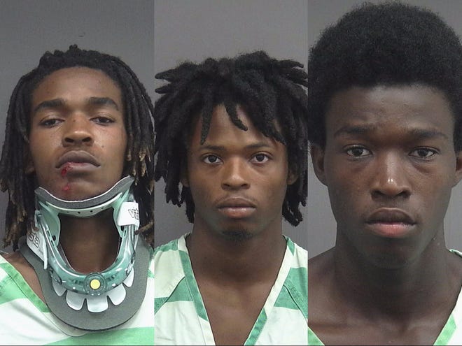 From left to right, Deon Roberts, 22, Schammi Joseph, 19, and Demarkus Williams, 19.