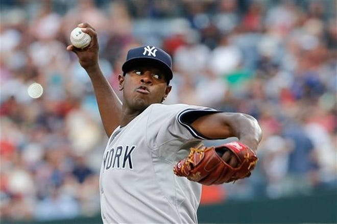 New York Yankees starting pitcher Luis Severino (40) works in the first inning of a baseball game against the Atlanta Braves Saturday, Aug. 29, 2015, in Atlanta. (John Bazemore/ Associated Press)