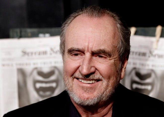 This Oct. 16, 2010, file photo shows Wes Craven arriving at the Scream Awards in Los Angeles. Craven, whose "Nightmare on Elm Street" and "Scream" movies made him one of the most recognizable names in the horror film genre, has died. He was 76. Craven's family said in a statement that he died in his Los Angeles home Sunday after battling brain cancer. (AP Photo/Matt Sayles, File)