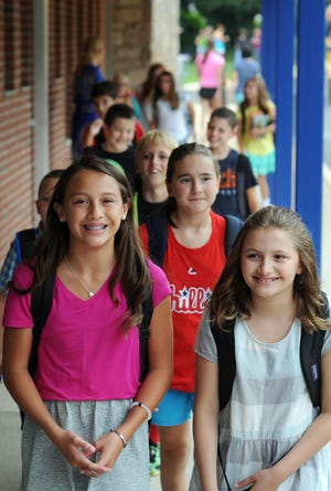 Students arrive at Linden Elementary School Monday August 31, 2015 in Doylestown, Pennsylvania. It was the first day of school in the Central Bucks School District. (Photo by William Thomas Cain)