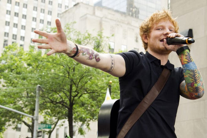 This July 12, 2013, file photo shows Ed Sheeran performing on NBC's "Today" show in New York. Sheeran is part of a breed of newer and lesser known acts who are able to sell out top venues, even if they arenít selling millions of albums and singles, or dominating with chart-topping tracks and radio airplay.