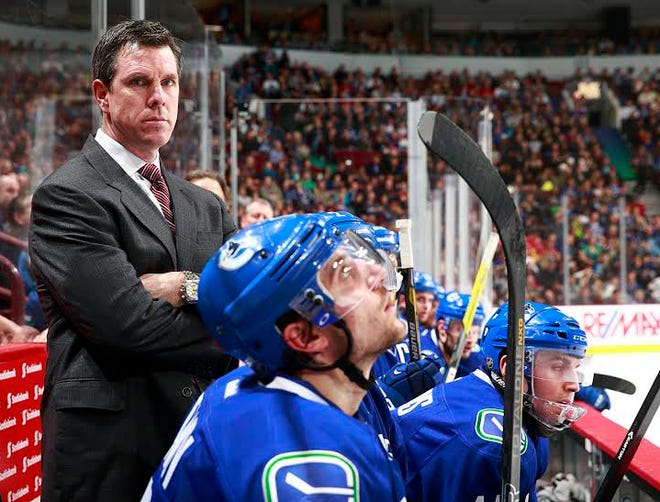 Marshfield's Mike Sullivan was an assistant coach with the Vancouever Canucks. Photo by Jeff Vinnick/NHLI via Getty Images