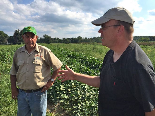 U.S. Rep. James McGovern, D-Worcester, right, discusses issues with Kenneth Foppema, left, during a tour of Foppema's farm in Northbridge Tuesday.