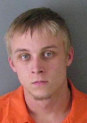 Police took 20-year-old Seth Ervin into custody Monday night after officers from four different agencies swarmed a home on Linwood Road.