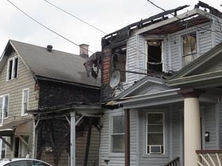 The aftermath of a fire at 307-309 Pleasant Street on August 28, 2015.