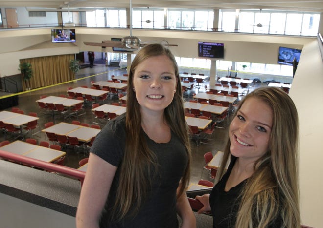 Morgan and Abbey Burke, twins from East Greenwich, are participating in Exploring Majors, Rhode Island College's new structured program that has replaced the undeclared major. The Providence Journal/Sandor Bodo