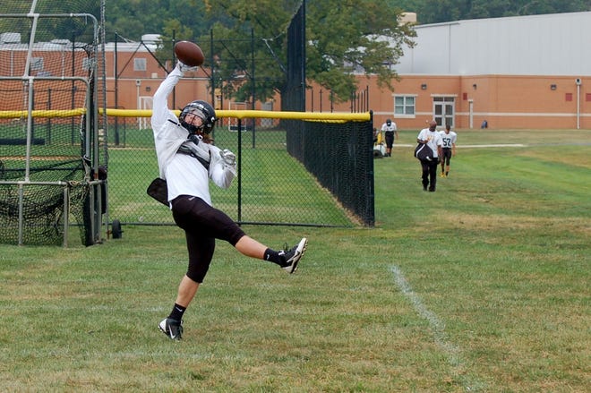 Moorestown receiver Greg Gamble picks a pass out of the air during a preseason practice. The Quakers open the 2015 high school football season at Winslow on Sept. 11.