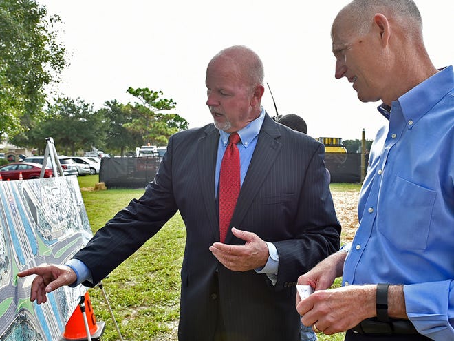 FDOT, communications specialist, Robin Stublen, on left, goes over some of the details of the "diverging diamond" interchange at Interstate 75, and University Parkway. The $75 million project is to provide congestion relief, and is on a tight timetable to finish before the 2017 World Rowing Championship. (Sept. 02, 2015; STAFF PHOTO / THOMAS BENDER)