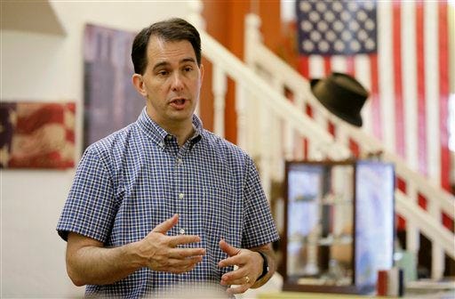 In this Aug. 27, 2015 file photo, Republican presidential candidate Wisconsin Gov. Scott Walker speaks in Greenfield, Iowa. File/The Associated Press