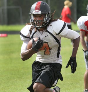 New Smyrna Beach tailback Darrynton Evans has made a habit of breaking off big plays thus far in this season. In his team's Kickoff Classic, he hit a spin move and took it to the house. Last week, he turned on the jets and went 80 yards. Evans, who has a handful of college offers including Army, Air Force and USF, enters his team's showdown with University as the Volusia/Flagler area's leading rusher. News-Journal/DAVID TUCKER