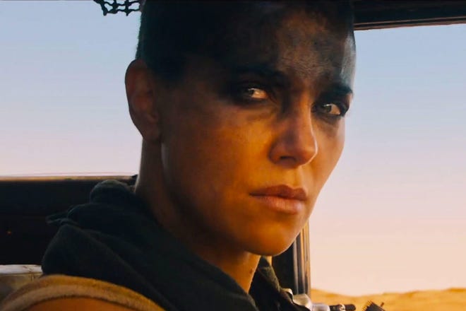 Charlize Theron plays Furiosa, a one-armed Amazonian courier of sorts and fellow rebel to Max in “Mad Max: Fury Road,” George Miller’s fourth attempt to create a post-apocalyptic action thriller in the outback, with excellent results.
