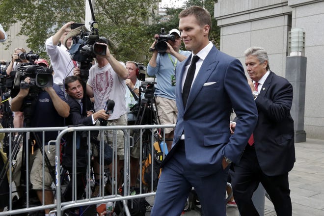 FILE - In this April 31, 2015, file photo, New England Patriots quarterback Tom Brady leaves Federal court in New York. Brady can suit up for his team's season opener after a judge erased his four-game suspension for "Deflategate." (AP Photo/Richard Drew, File)