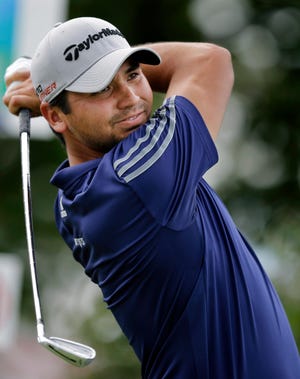 With a victory this weekend, Jason Day could unseat Rory McIlroy as the world's top-ranked player. THE ASSOCIATED PRESS