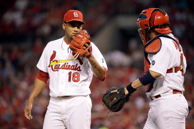 Catcher Yadier Molina's advice didn't help Cardinals starter Carlos Martinez during St. Louis' 9-3 loss to the Pittsburgh Pirates on Friday night. JEFF ROBERSON/THE ASSOCIATED PRESS