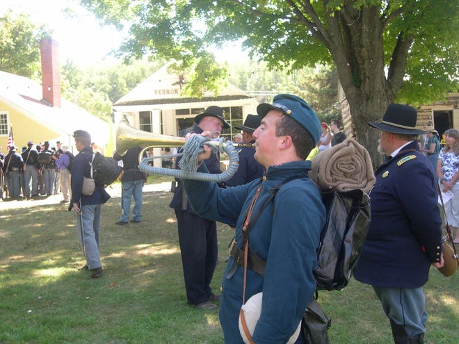 Don Lopuzzo of Clifton, N.J., a music teacher, plays the part of a bugler at Saturday's Civil War re-enactment at Museum Village. RICHARD J. BAYNE/TIMES HERALD-RECORD