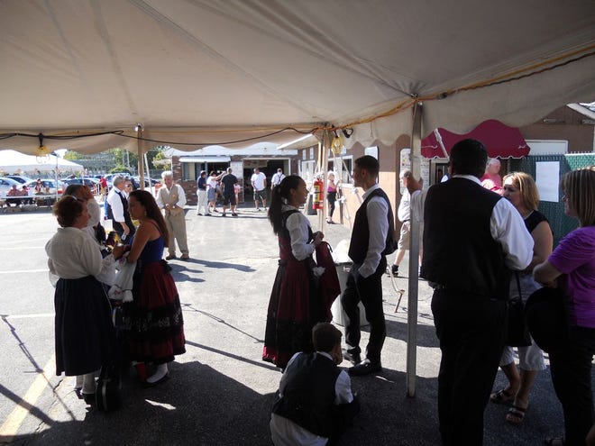 On Sunday afternoon, the Liberal Club parking lot was full of people listening to Portuguese music, eating, watching folkloric dancers and enjoying the warm sunshine at the annual Holy Ghost Feast.