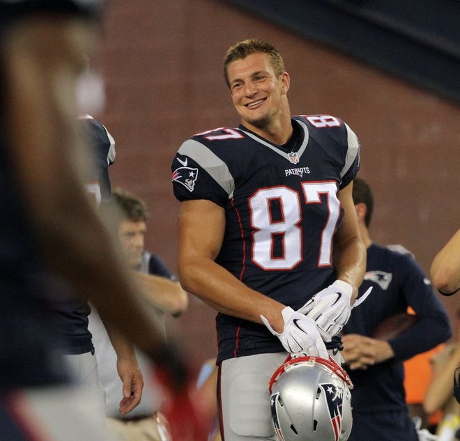 Rob Gronkowski didn't play, but was all smiles on the sidelines for the preseason game against the Giants.