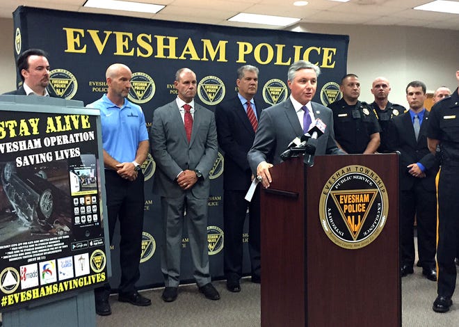 Evesham Mayor Randy Brown is joined by police and business leaders Monday as he announced a free shuttle service home from Evesham restaurants and bars.
