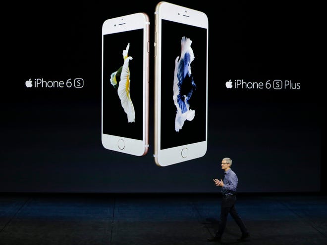 Apple CEO Tim Cook discusses the new iPhone 6s and iPhone 6s Plus during the Apple event at the Bill Graham Civic Auditorium in San Francisco, Wednesday, Sept. 9, 2015