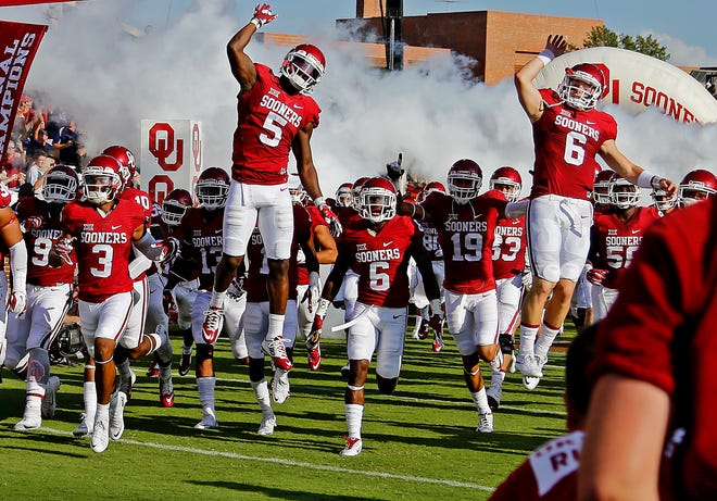 Oklahoma's Baker Mayfield (6) runs onto the field with the rest of the OU football team before a college football game between the University of Oklahoma Sooners (OU) and the Akron Zips at Gaylord Family-Oklahoma Memorial Stadium in Norman, Okla., Saturday, September 5, 2015. Photo by Bryan Terry, The Oklahoman