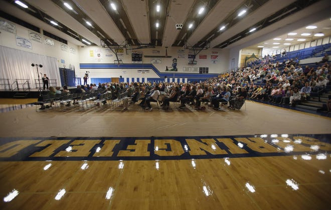 Springfield schoolteachers, administrators and guests listen as Springfield School District superintendent Dr. Sue Rieke-Smith delivers her back-to-school welcome speech at Springfield High School in Springfield on Tuesday, September 8, 2015. (Andy Nelson/The Register-Guard)