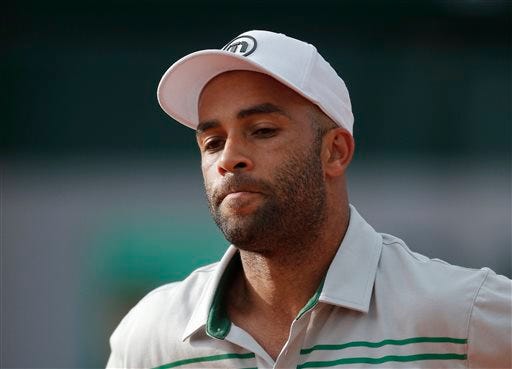 FILE - In this May 26, 2013, file photo, James Blake grimaces after missing a return against Serbia's Viktor Troicki at the French Open tennis tournament in Paris. Internal affairs detectives are investigating claims by former tennis professional James Blake that he was thrown to the ground and then handcuffed while mistakenly being arrested Wednesday, Sept. 9, 2015, at a New York hotel, police said. Blake, who's biracial, told the Daily News he wasn't sure if he was arrested because of his race but said the officer who put him in handcuffs inappropriately used force. (AP Photo/Michel Spingler, File)