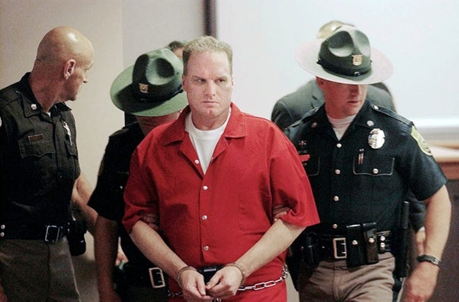 Gary Lee Sampson is escorted into court during his 2004 trial in Nashua, N.H. He is awaiting a second sentencing trial after a federal judge overturned his death sentence four years ago.

Jim Cole / AP file photo