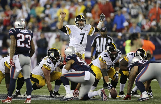 Ben Roethlisberger (7) calls signals at the line of scrimmage in the second half against the New England Patriots on Thursday, in Foxborough, Mass.