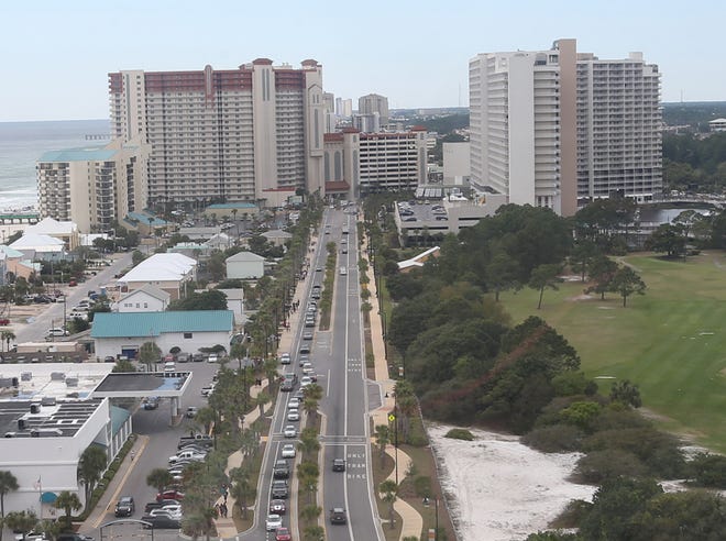 Traffic backs up along Thomas Drive on March 27 in Panama City Beach. Some condominium owners are concerned about a proposed Spring Break ordinance that would require them to register their units with the city for short-term rentals.