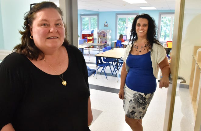Judy Cody, executive director, left, and Lisa King, director of education and children's services, right, pose for a photo inside Beverly Children's Learning Center on Thursday, Sept. 3. Wicked Local Staff Photo / David Sokol