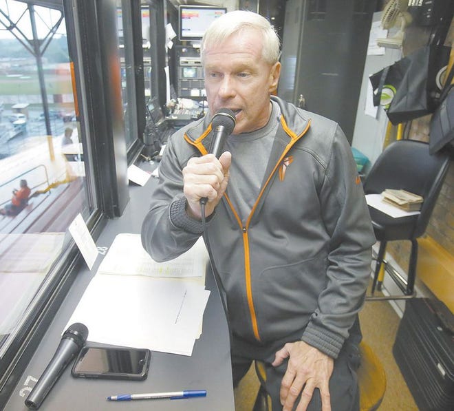 Massillon Tigers longtime voice Walt Bronczek makes a call during the team’s Week 2 game against GlenOak at Paul Brown Tiger Stadium.
