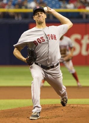 Red Sox starter Rich Hill delivers a pitch in the first inning. The Associated Press