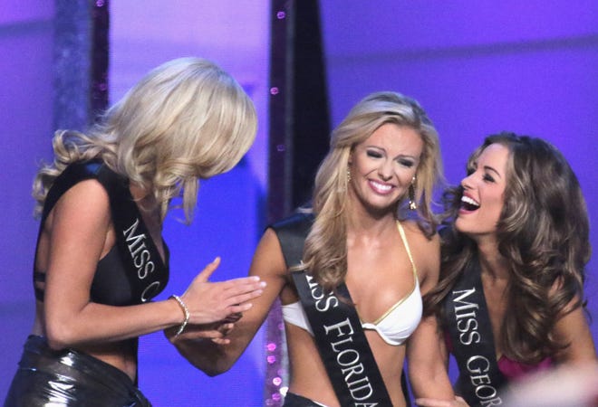 Miss Florida MaryKatherine Fechtel reacts to being the first contestant named in the Top 10 at Miss America on Sunday.