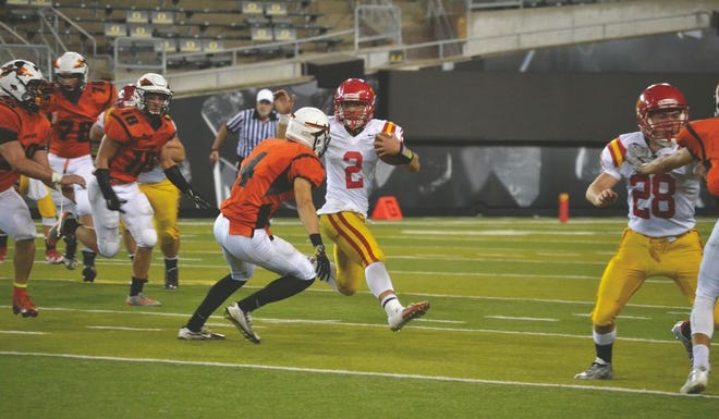 Drew Kannely-Robles of the Yreka Miners runs with the ball during a game versus Scappoose at Autzen Stadium in Eugene, Ore. on Saturday night.