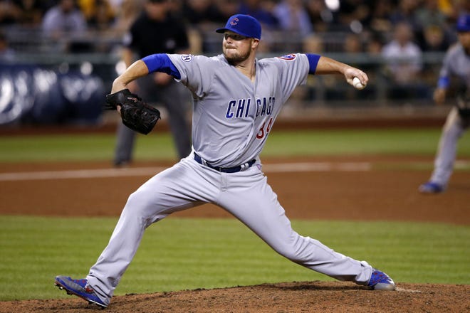 Chicago Cubs starting pitcher Jon Lester (34) delivers in the fifth inning of the second game of a doubleheader against the Pirates in Pittsburgh, on Tuesday. Lester threw a complete game 2-1 win over the Pirates.