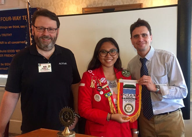 From left: Rotarian and Youth Exchange Officer Alex Falk, Wienona Setiawan and Marblehead Rotary Club President Zach Newell. Setiawan delivered the Rotary Club flag from Bandung, Indonesia. Courtesy Photo