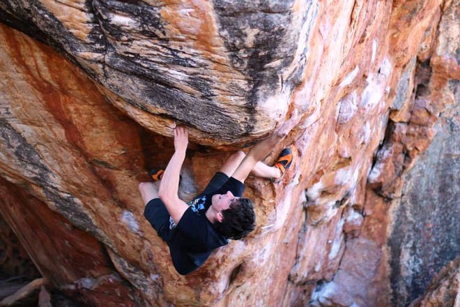 Brian Nugent, 18, of Bedford, navigates his way along a challenging climb in the Rocklands area near Cederberg, South Africa. Nugent and three friends spent part of a a memorable summer conquering nearly 30 different climbing routes in Rocklands. Courtesy photo