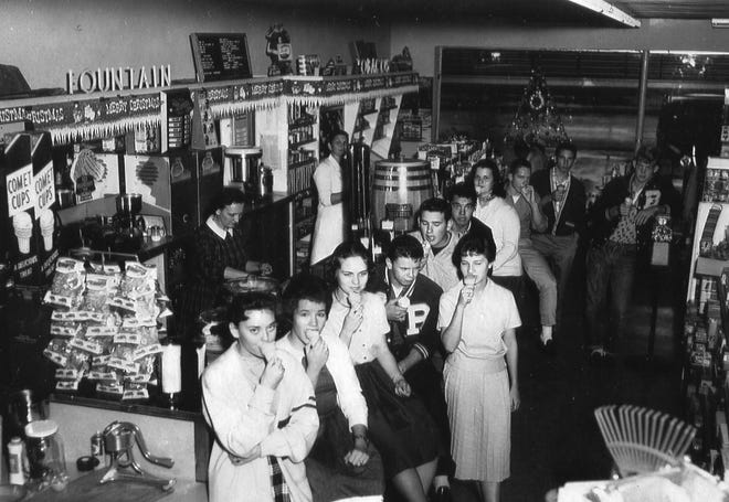 Members of the Bunnell High School Class of 1961 enjoy ice cream at Anderson Drugs in this December 1960 photograph. FLAGER COUNTY HISTORICAL SOCIETY